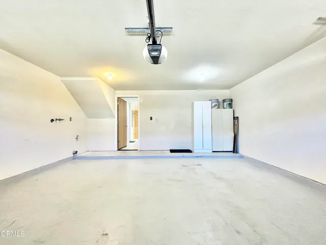 a view of a hallway with a swimming pool
