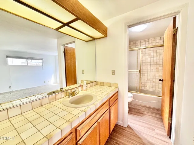 an empty room with a windows