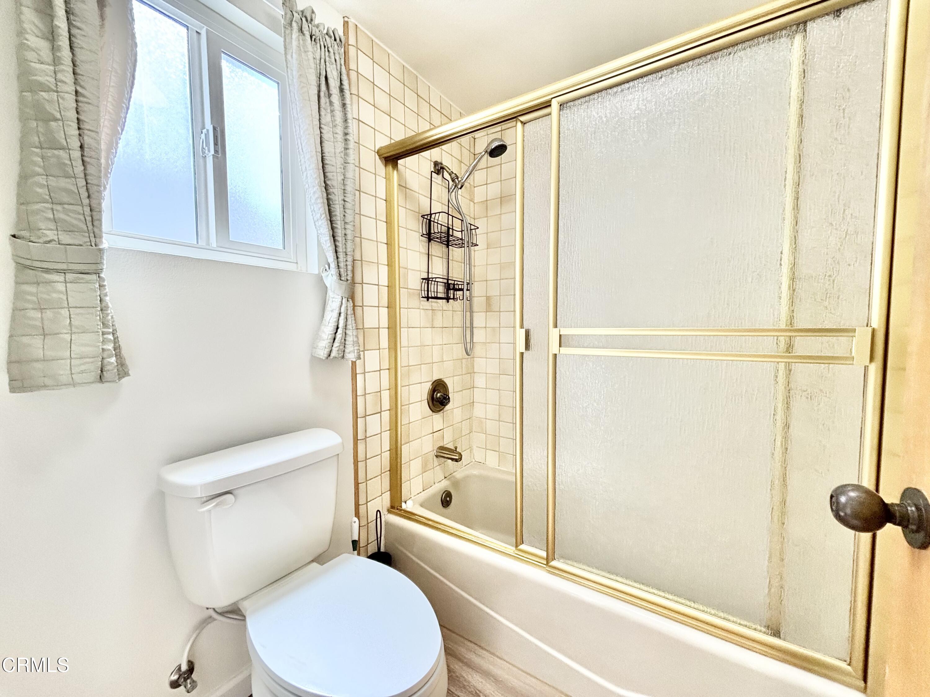 272 Cahuenga Drive Oxnard, CA 93035 - Photo 28 of 39 a white toilet sitting next to a bathroom next to a shower