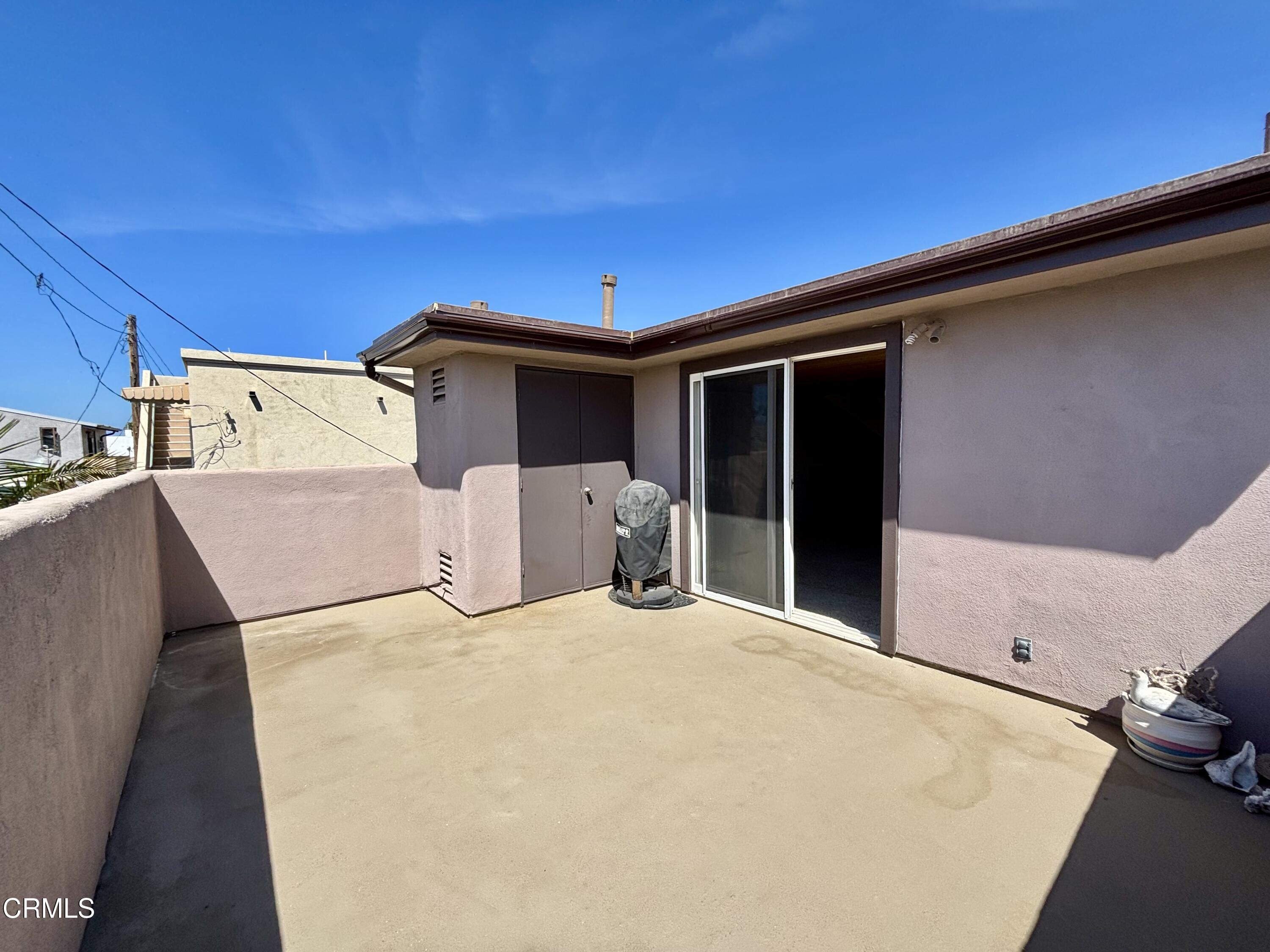 272 Cahuenga Drive Oxnard, CA 93035 - Photo 34 of 39 a backyard of a house with table and chairs