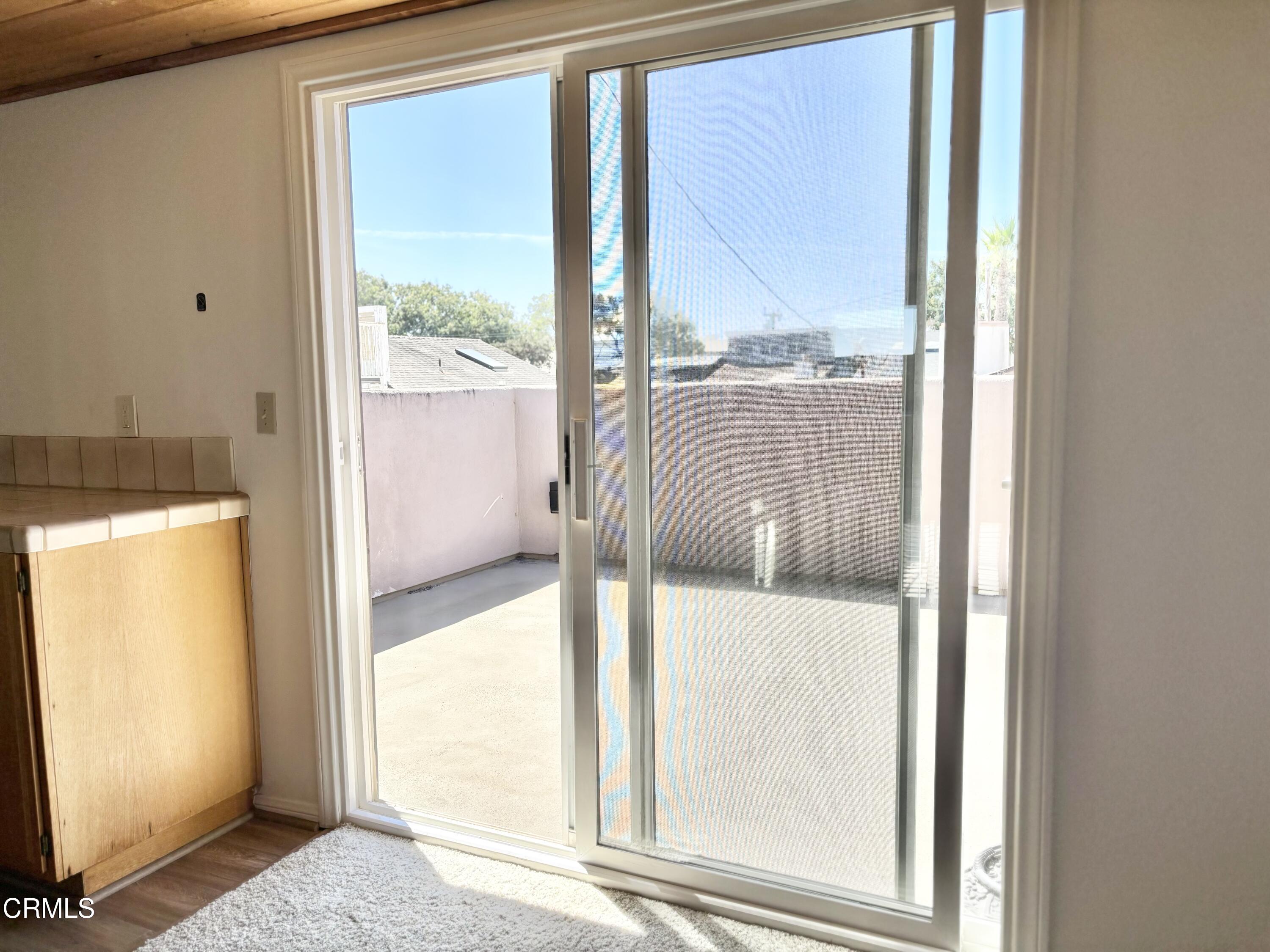 272 Cahuenga Drive Oxnard, CA 93035 - Photo 36 of 39 a view of a glass door and a room