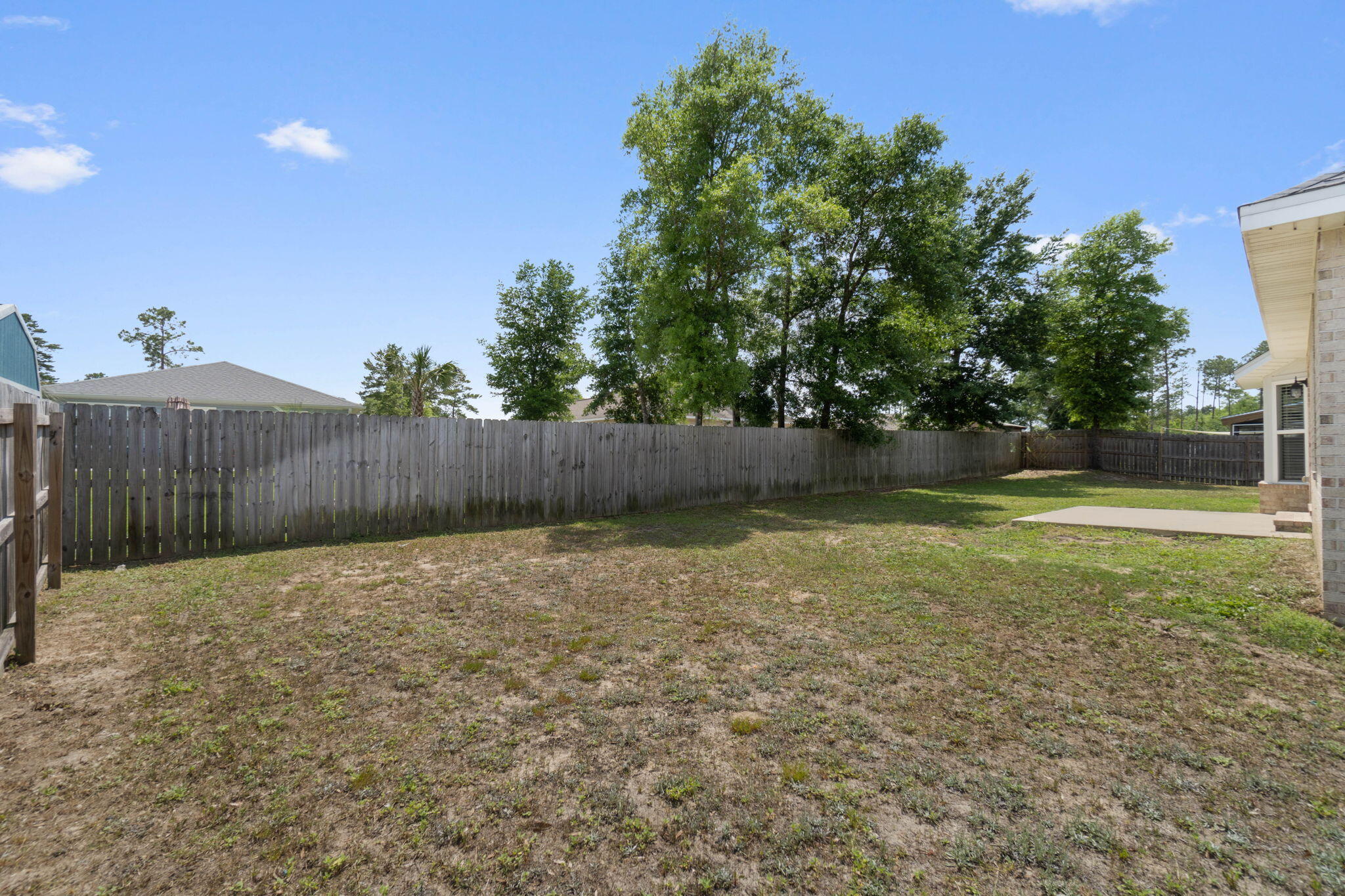 4464 Goldfinch Way Crestview, FL 32539 - Photo 30 of 31 a view of garden with wooden fence