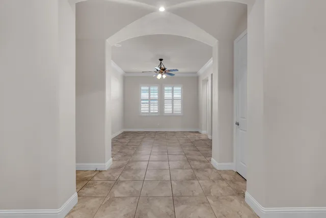 a view of an empty room and window