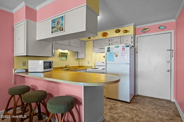 $560,000 | 10300 Coast Guard Road, Unit A205, Emerald Isle, NC 28594