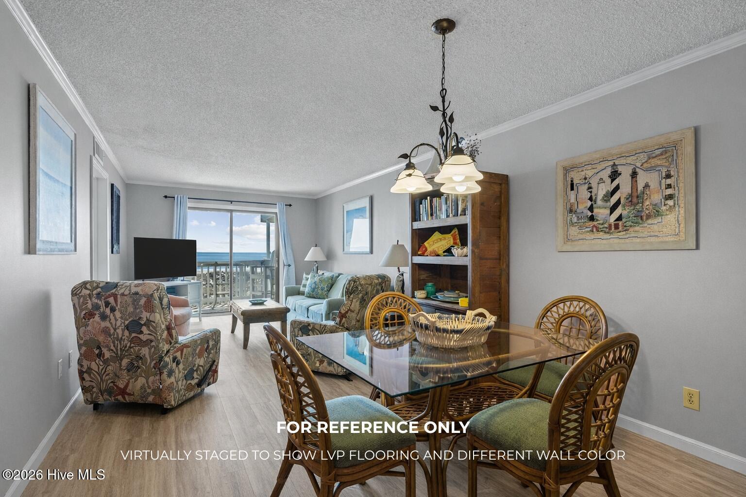 10300 Coast Guard Road, Unit A205 Emerald Isle, NC 28594 - Photo 8 of 46 *For reference only - virtually staged to show what condo could look like with LVP flooring and different color walls