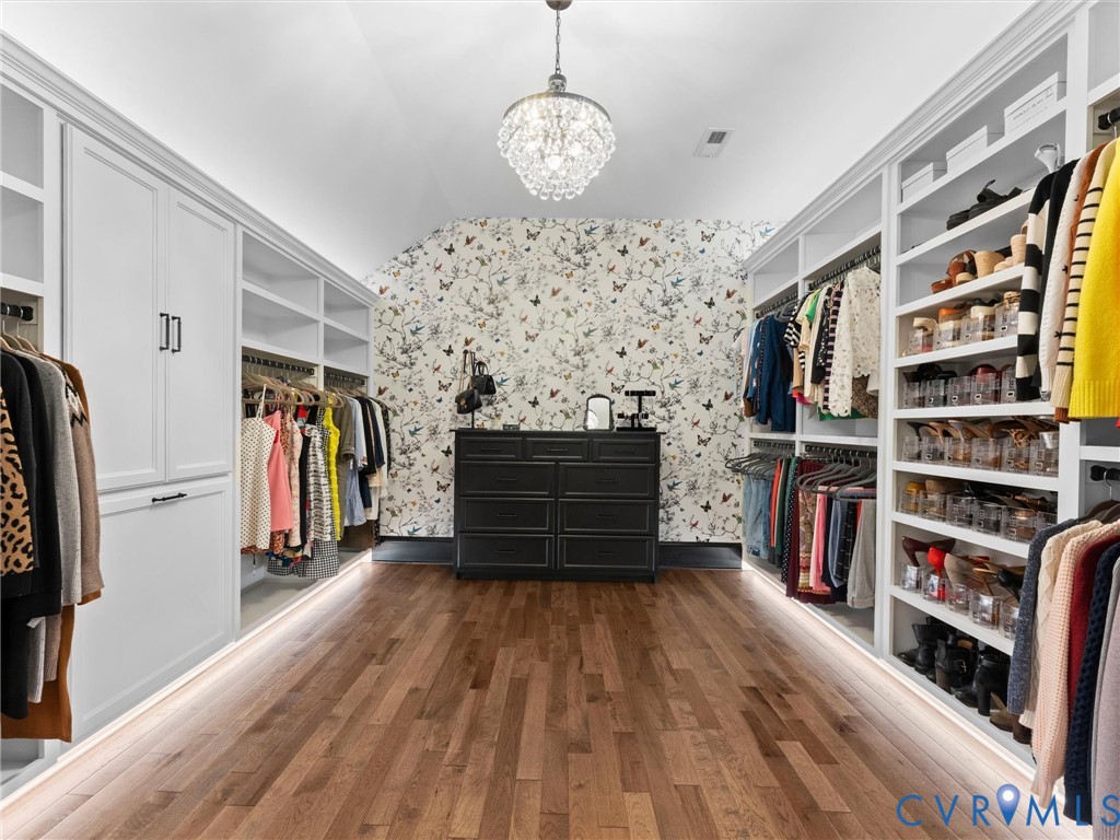 1925 Limbeck Lane Midlothian, VA 23112 - Photo 42 of 89 a view of a walk in closet with wooden floor and a window