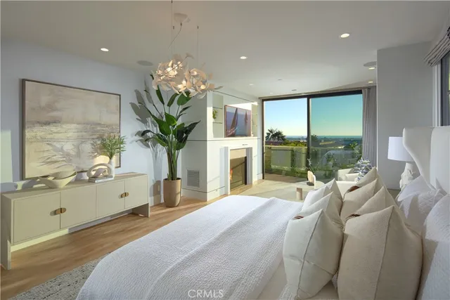 a spacious bedroom with a large bed and a large window