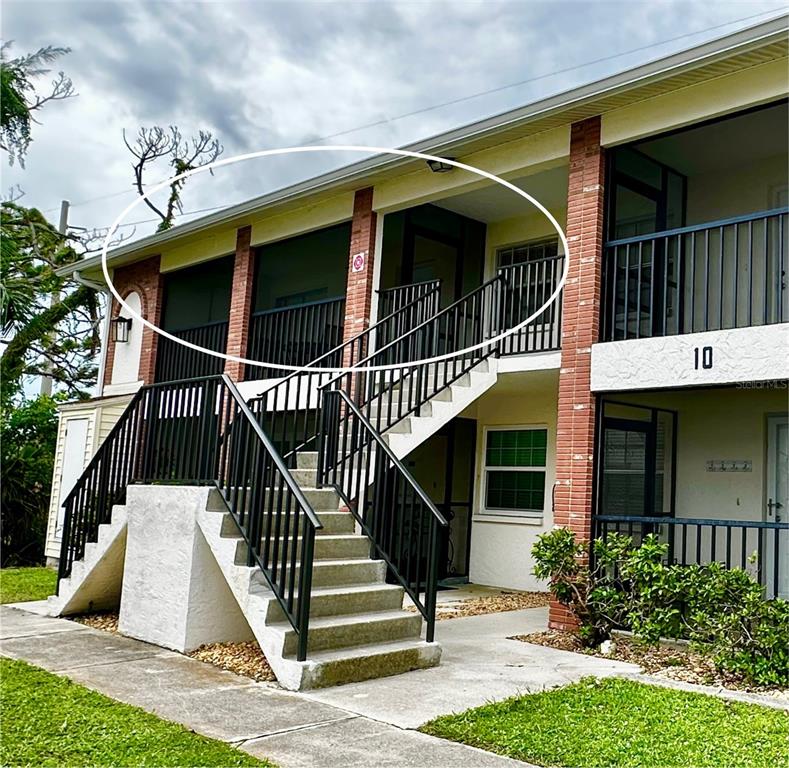1531 Placida Road, Unit 10201 Englewood, FL 34223 - Photo 1 of 1 a view of entryway with a front door