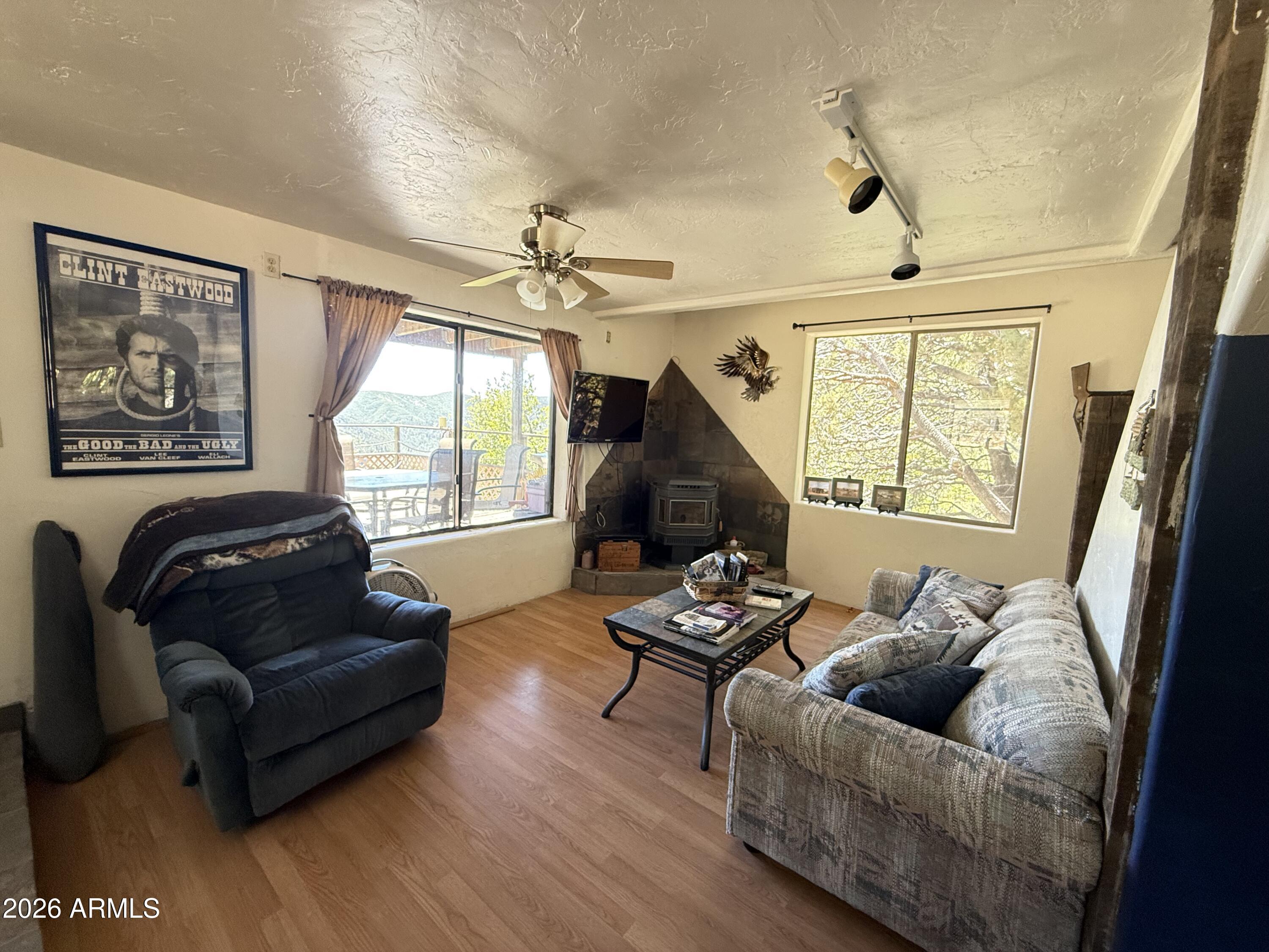 22406 South Eagle Mine Road Crown King, AZ 86343 - Photo 4 of 20 a living room with furniture and a window