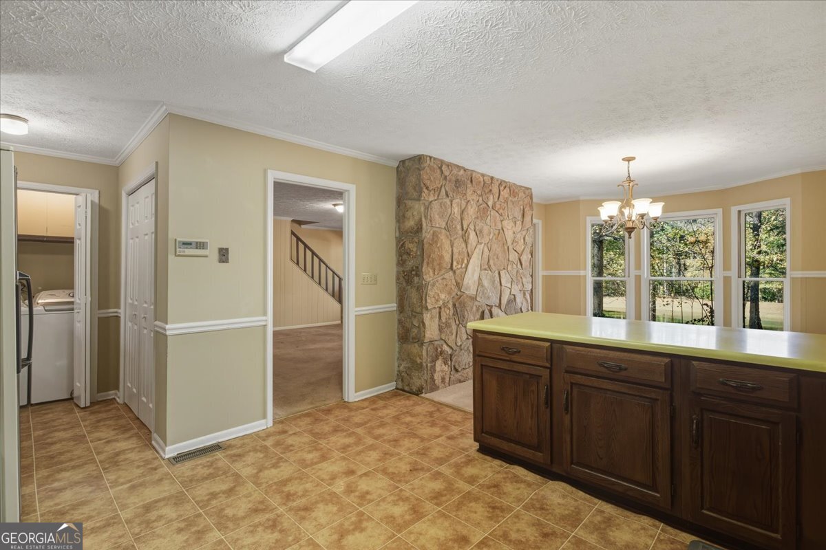 590 South New Salem Road Griffin, GA 30223 - Photo 12 of 52 a view of a kitchen with a sink and a window