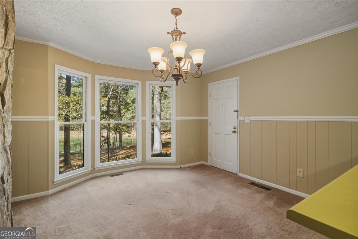 590 South New Salem Road Griffin, GA 30223 - Photo 14 of 52 a view of an empty room with a window