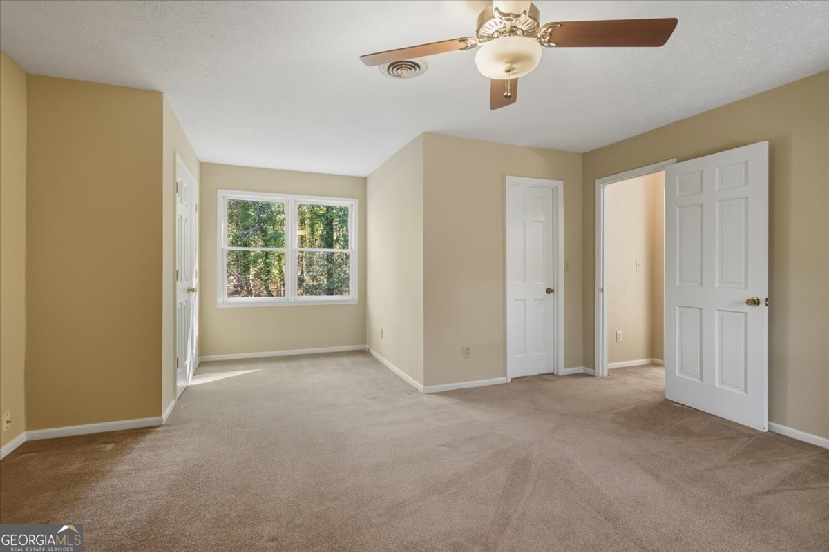 590 South New Salem Road Griffin, GA 30223 - Photo 29 of 52 a view of an empty room with a window