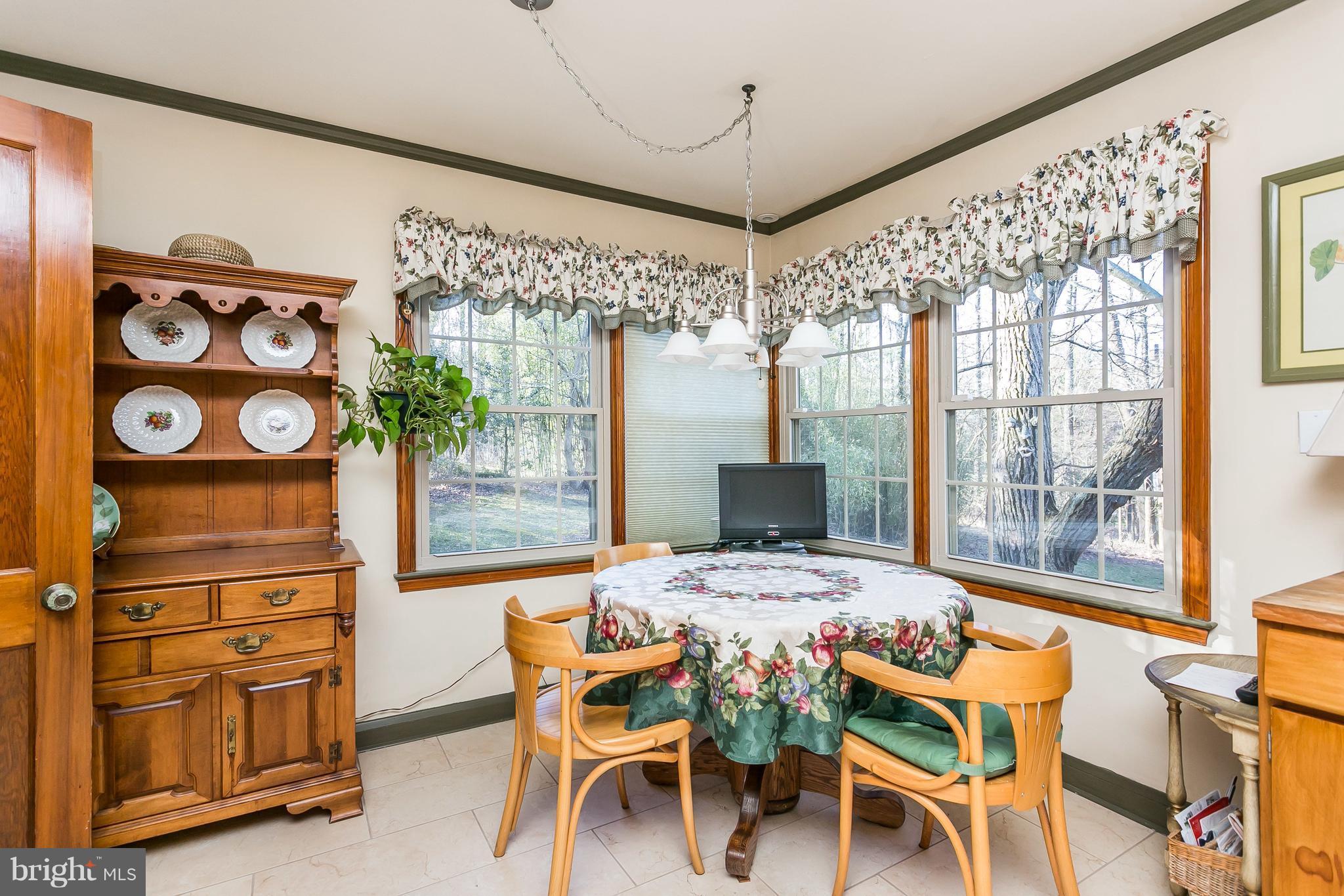 1316 Doves Cove Road Towson, MD 21286 - Photo 11 of 30 Breakfast Area surrounded by windows & view!