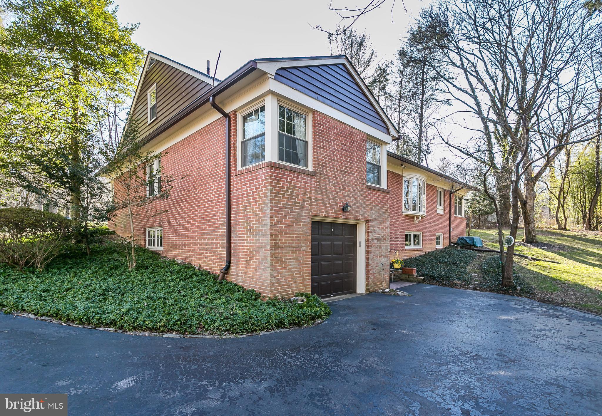 1316 Doves Cove Road Towson, MD 21286 - Photo 27 of 30 Large parking pad plus two spaces off mid-driveway