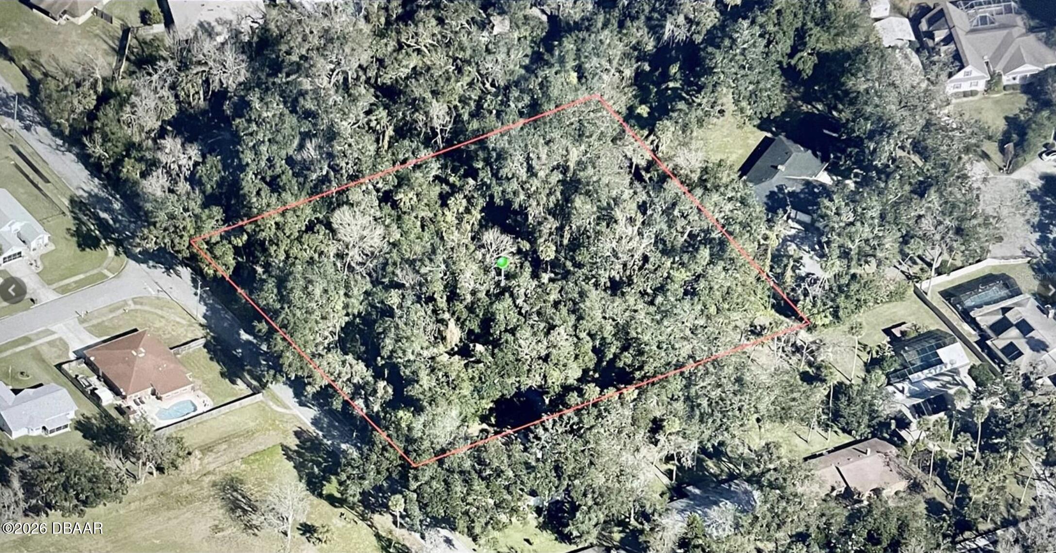 0 Pepper Hill Road Port Orange, FL 32129 - Photo 1 of 4 a backyard of a house with lots of trees