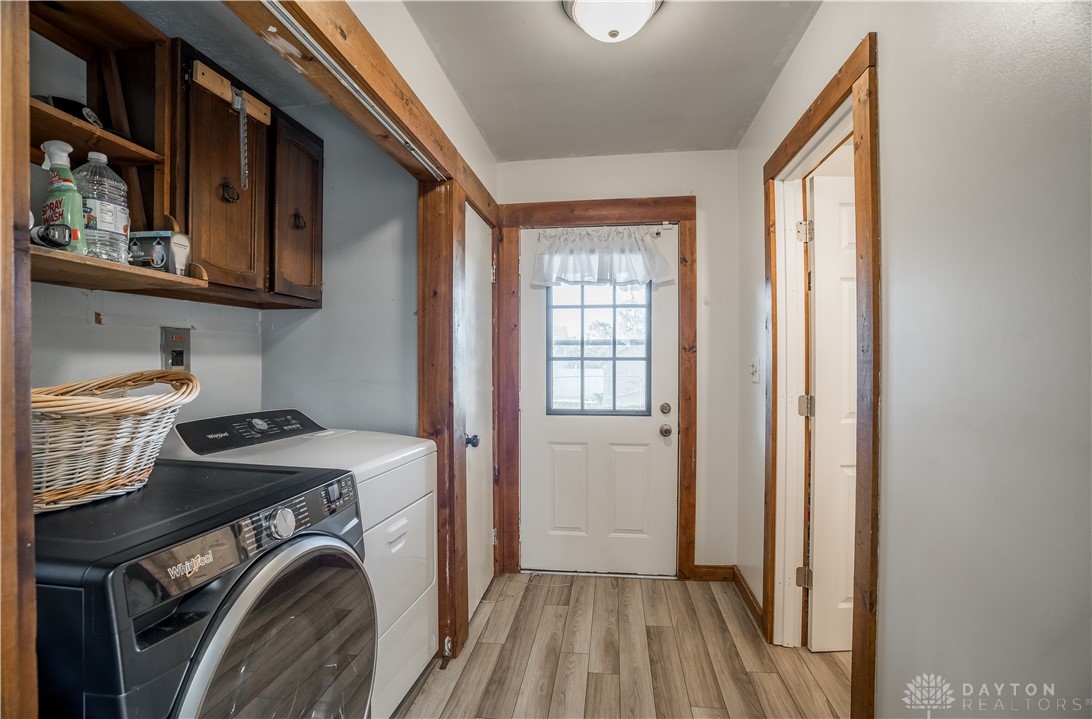 220 Racer Street Troy, OH 45373 - Photo 17 of 33 This functional space offers dedicated laundry facilities for everyday convenience, a pantry and adjacent full bath.