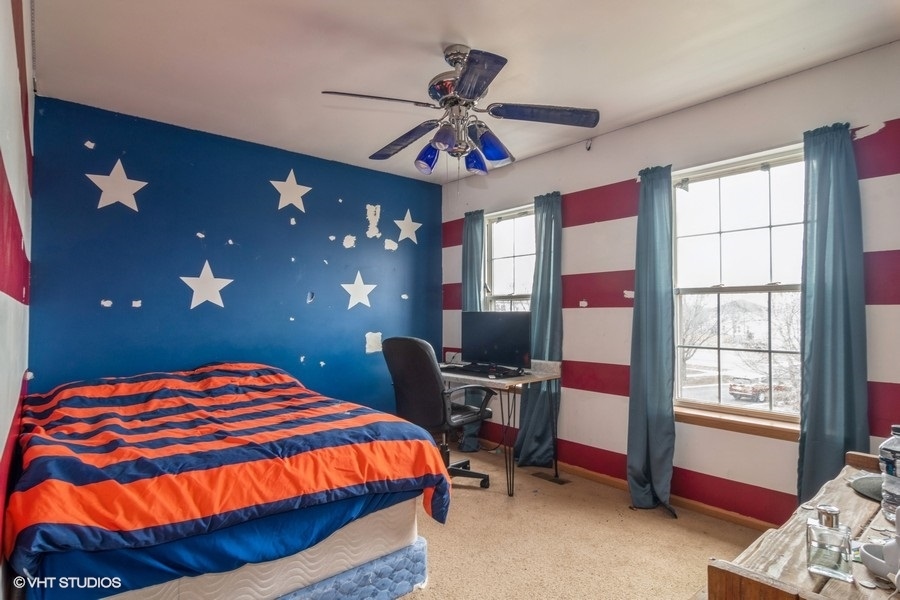 384 Kensington Drive Oswego, IL 60543 - Photo 12 of 15 a bedroom with a bed and a window