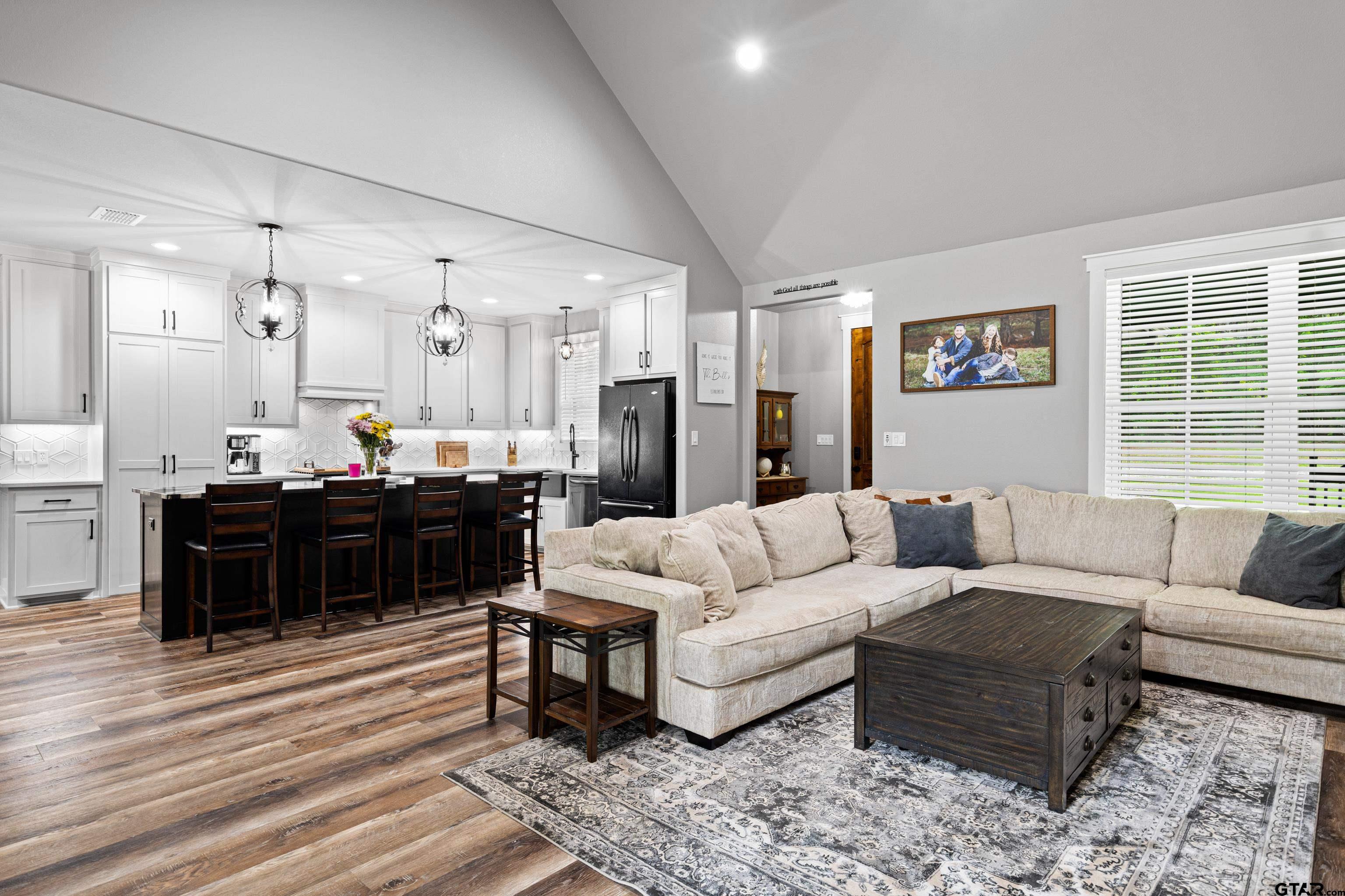 2505 Airstrip Road Gilmer, TX 75644 - Photo 11 of 37 a living room with furniture and a table