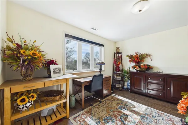 a view of a workspace with furniture