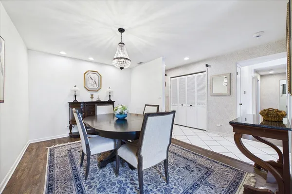 a view of a dining room and kitchen