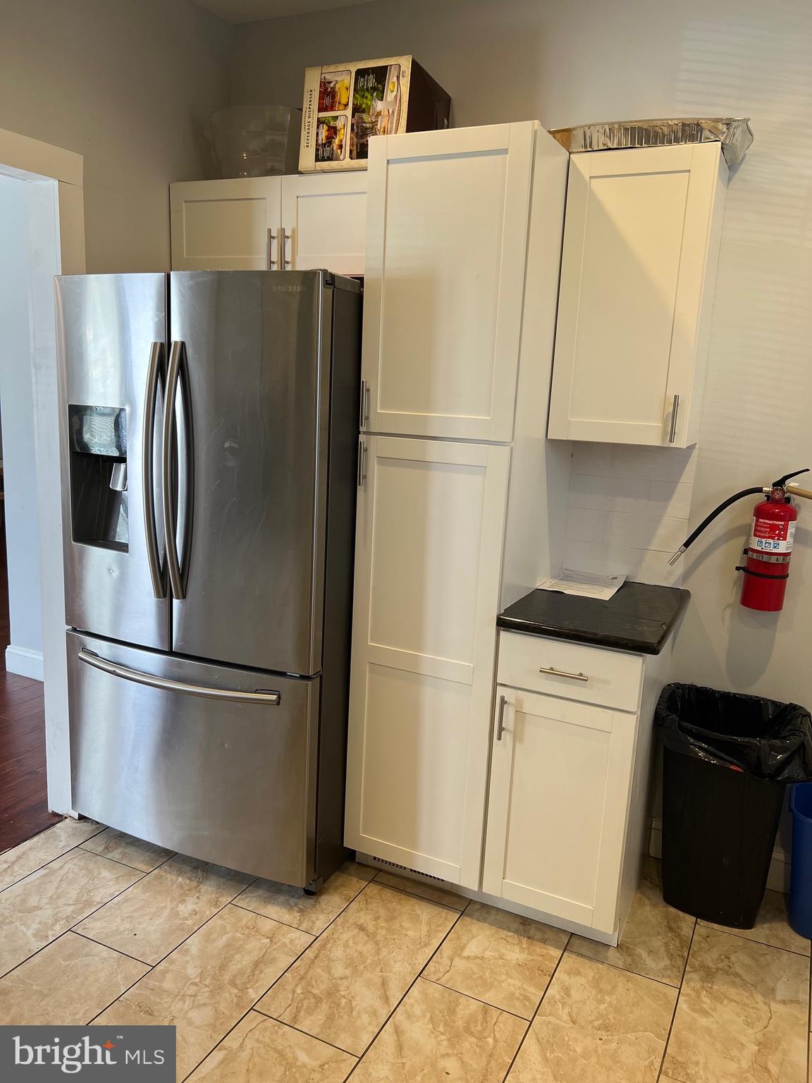 811 Laurel Road Lindenwold, NJ 08021 - Photo 9 of 29 a metallic refrigerator freezer sitting in a kitchen