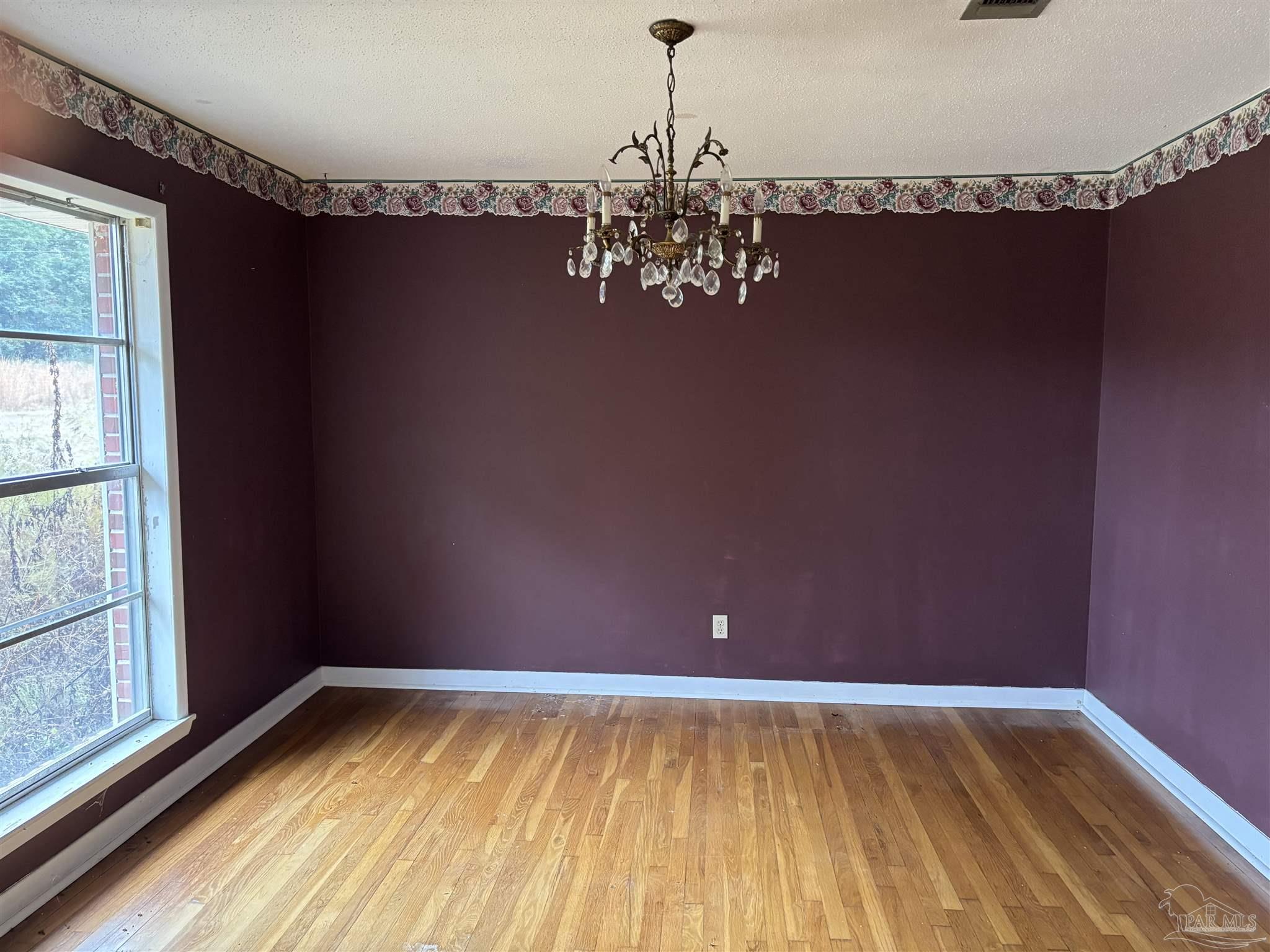 100 Brown Road McDavid, FL 32568 - Photo 5 of 20 a view of a room with window and a chandelier