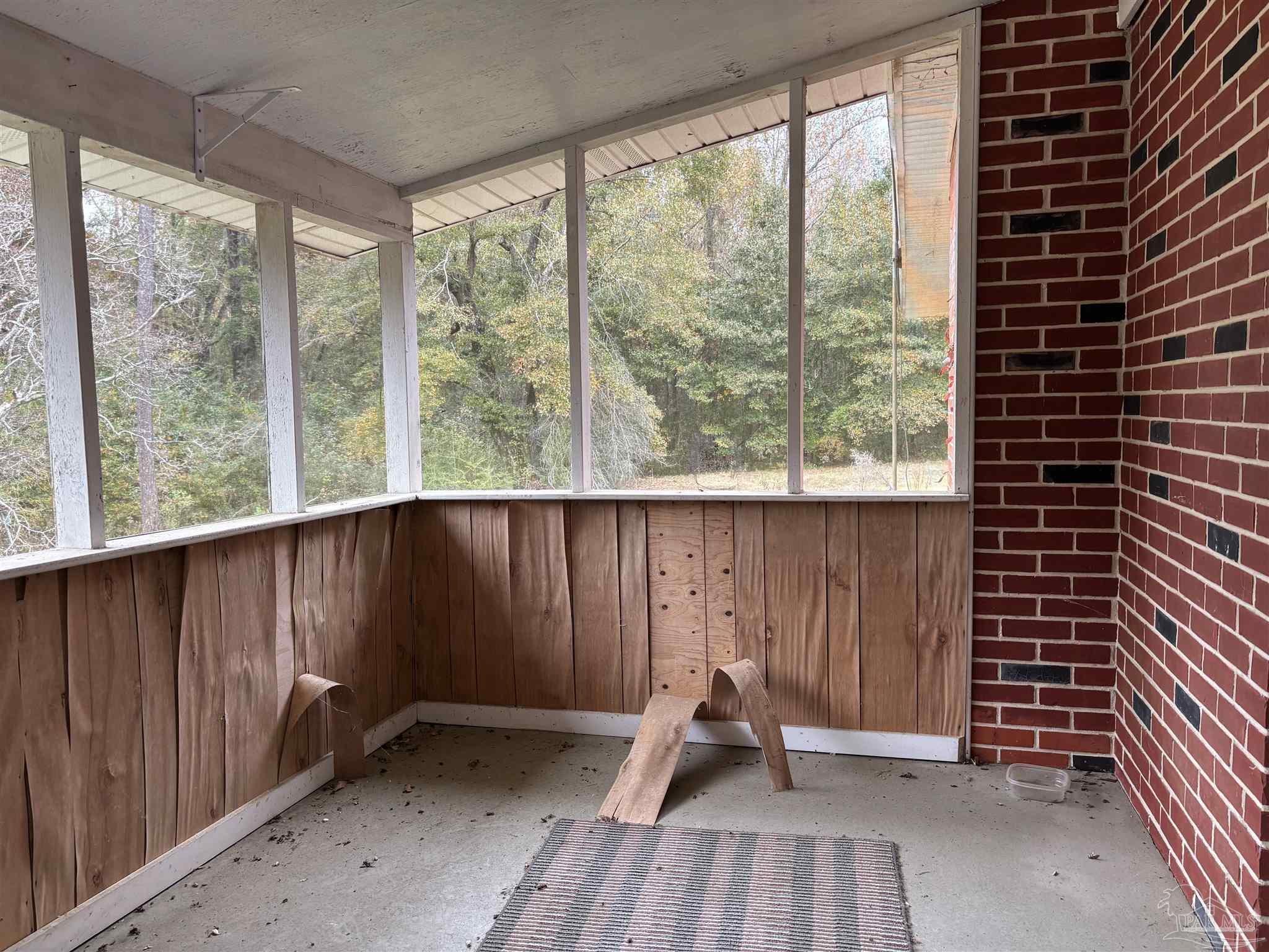 100 Brown Road McDavid, FL 32568 - Photo 9 of 20 a view of wooden floor in a balcony