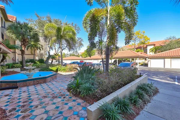 a view of swimming pool with an outdoor space and seating area