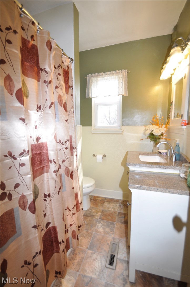 1899 West Pleasant Valley Road Parma, OH 44134 - Photo 30 of 47 Bathroom with vanity, toilet, and tile floors