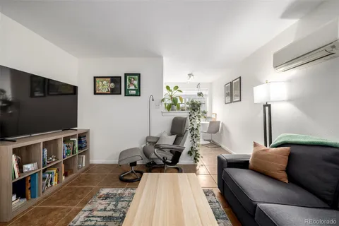 a living room with furniture and a couch