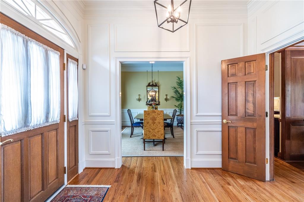 950 Heritage Hills Road Decatur, GA 30033 - Photo 15 of 88 a view of a hallway with wooden floor and dining room