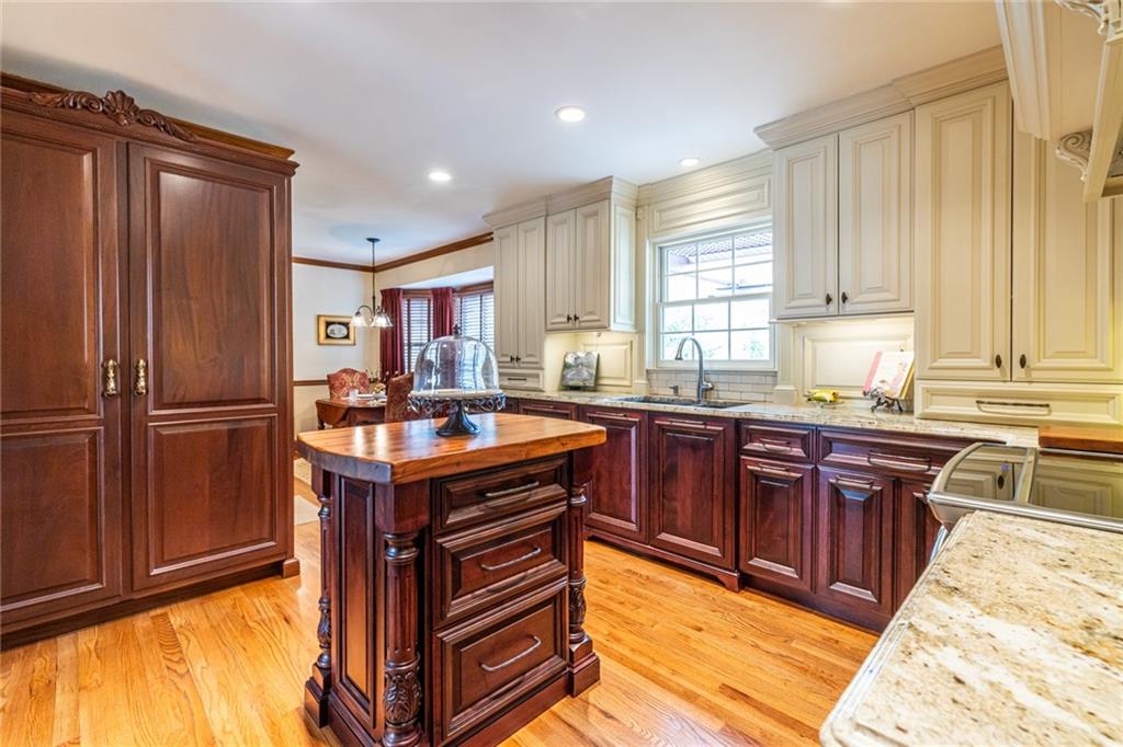 950 Heritage Hills Road Decatur, GA 30033 - Photo 21 of 88 a kitchen with stainless steel appliances granite countertop a stove a refrigerator and a sink