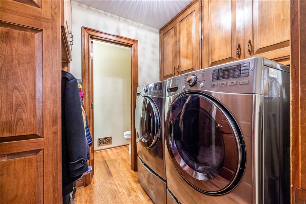 950 Heritage Hills Road Decatur, GA 30033 - Photo 30 of 88 a view of a hallway with washer and dryer