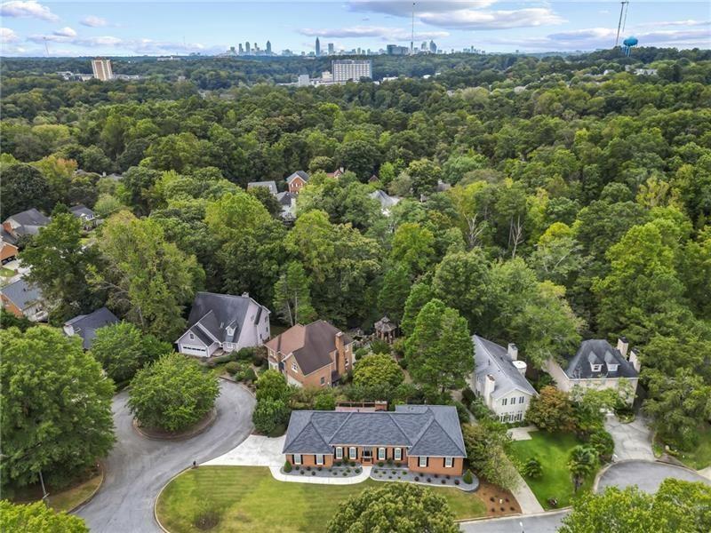950 Heritage Hills Road Decatur, GA 30033 - Photo 3 of 88 an aerial view of a house with yard swimming pool and mountain view