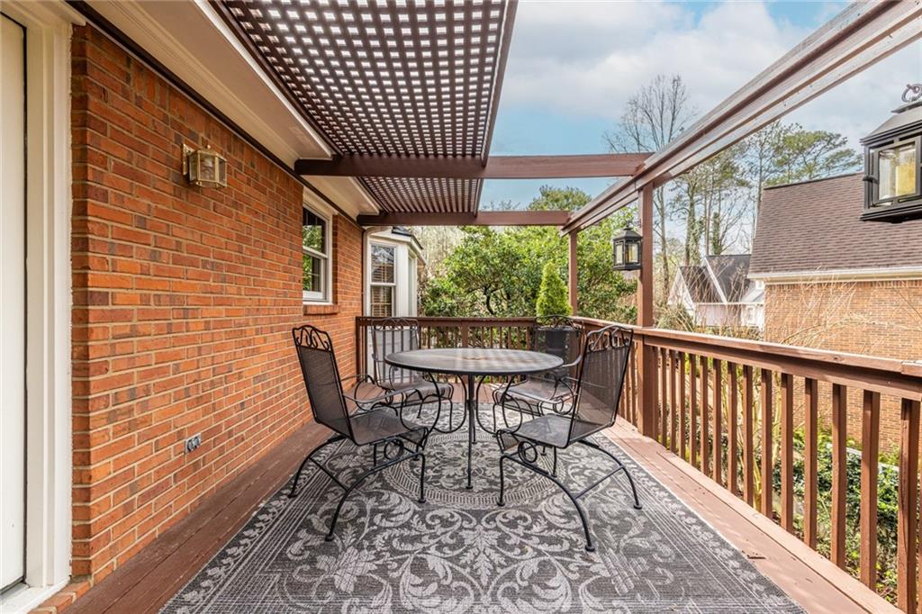 950 Heritage Hills Road Decatur, GA 30033 - Photo 39 of 88 a view of a chairs and table in the balcony