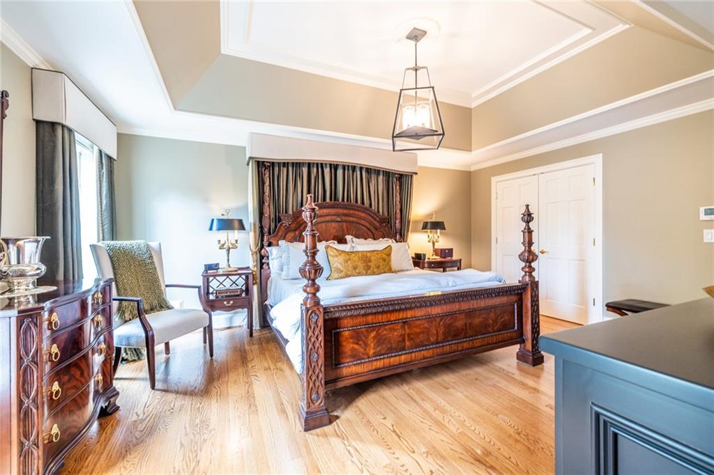 950 Heritage Hills Road Decatur, GA 30033 - Photo 42 of 88 a bedroom with furniture and a chandelier