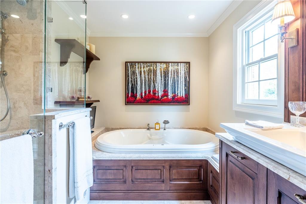 950 Heritage Hills Road Decatur, GA 30033 - Photo 47 of 88 a bathroom with a sink a vanity and a mirror