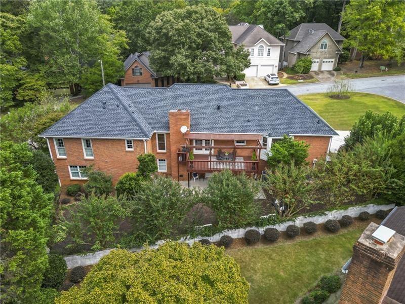 950 Heritage Hills Road Decatur, GA 30033 - Photo 5 of 88 a aerial view of a house with a yard table and chairs