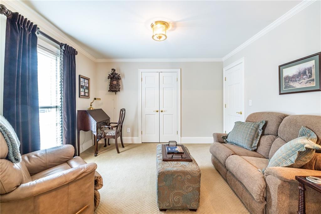 950 Heritage Hills Road Decatur, GA 30033 - Photo 56 of 88 a living room with furniture and a window