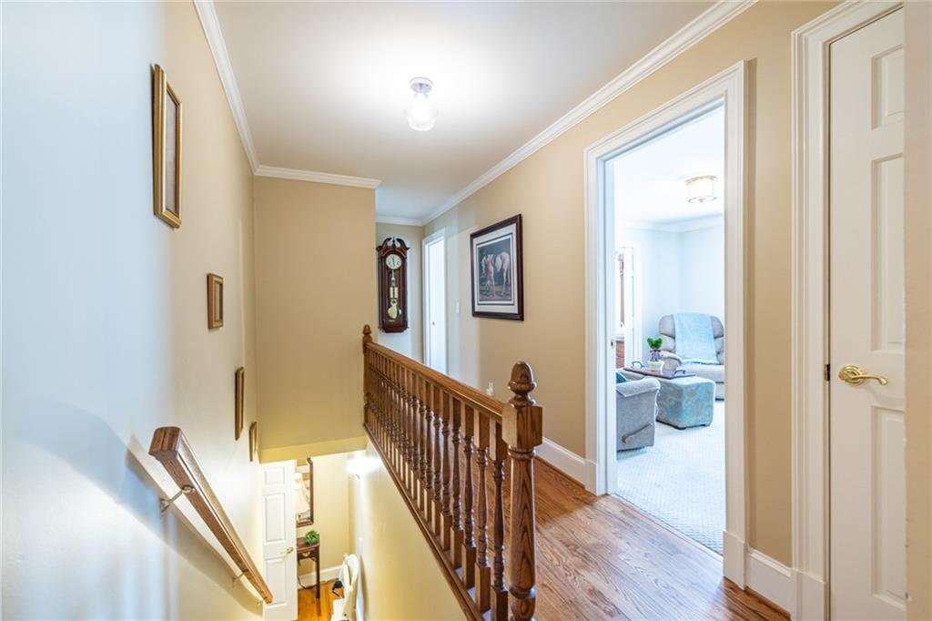 950 Heritage Hills Road Decatur, GA 30033 - Photo 57 of 88 a view of a hallway with wooden floor and stairs