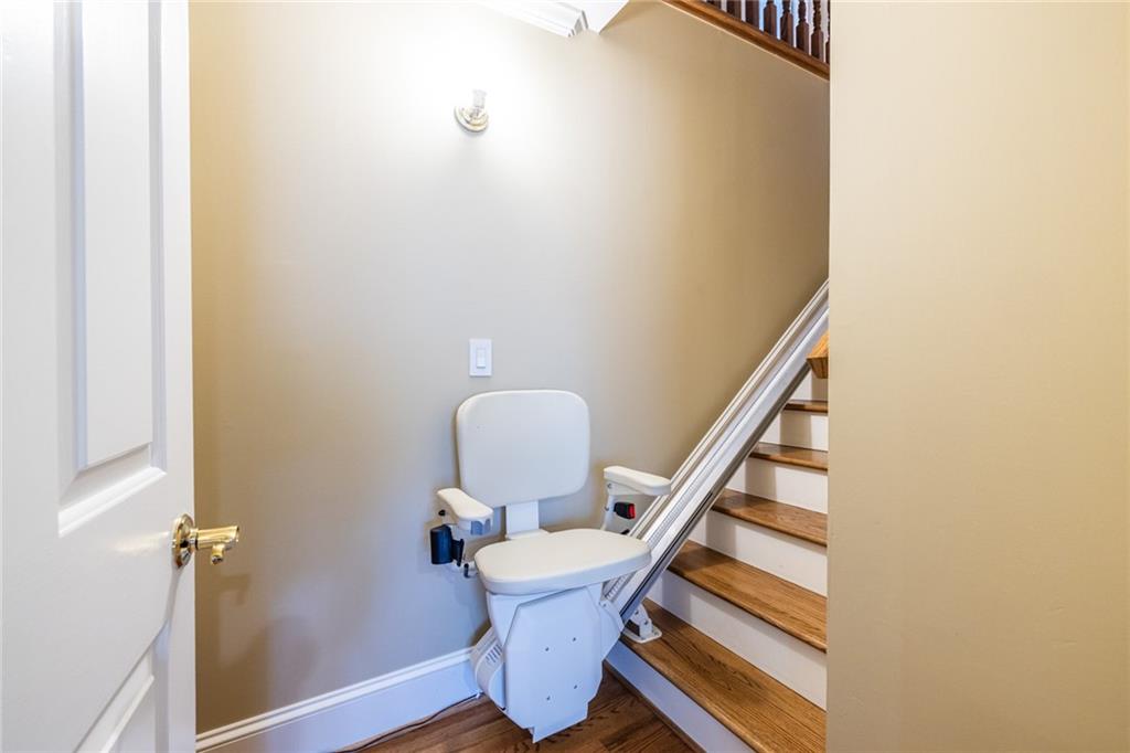 950 Heritage Hills Road Decatur, GA 30033 - Photo 58 of 88 a view of a hallway with wooden floor and staircase