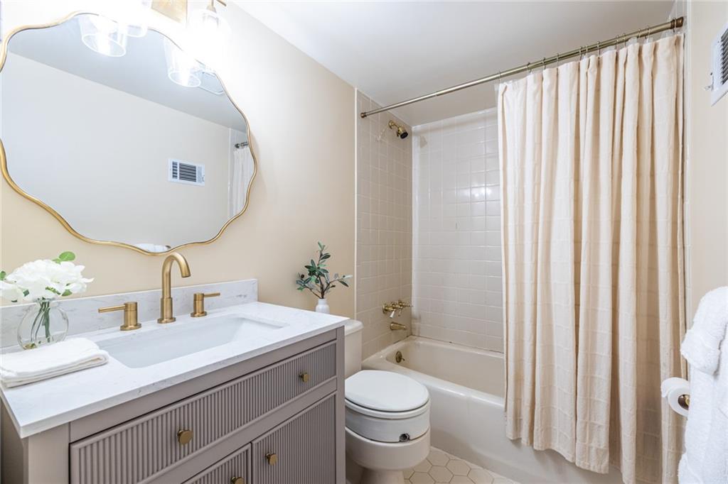 950 Heritage Hills Road Decatur, GA 30033 - Photo 70 of 88 a bathroom with a granite countertop sink toilet and shower