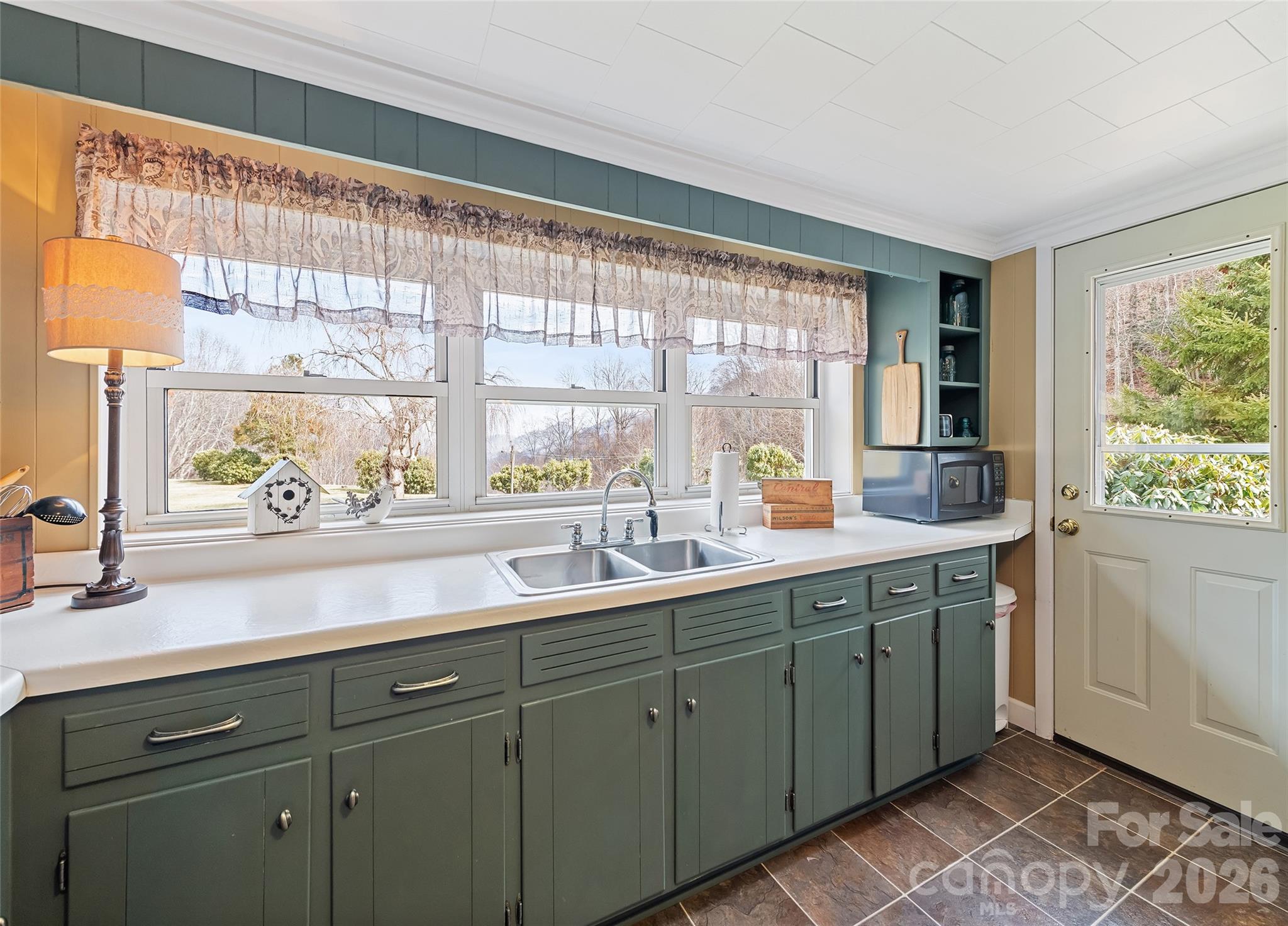 15 Whitted Road Canton, NC 28716 - Photo 12 of 38 a kitchen with a sink and large window