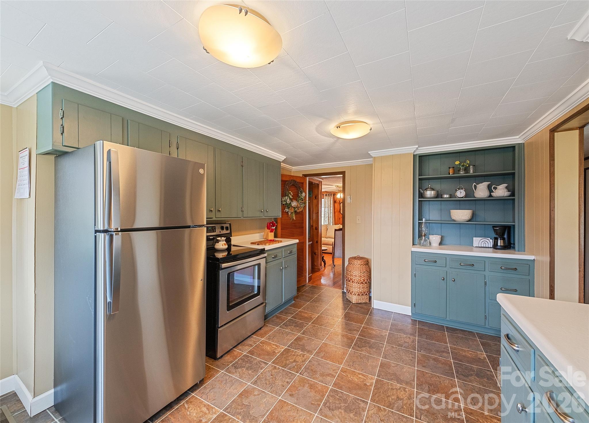 15 Whitted Road Canton, NC 28716 - Photo 13 of 38 a kitchen with stainless steel appliances granite countertop a refrigerator and a sink