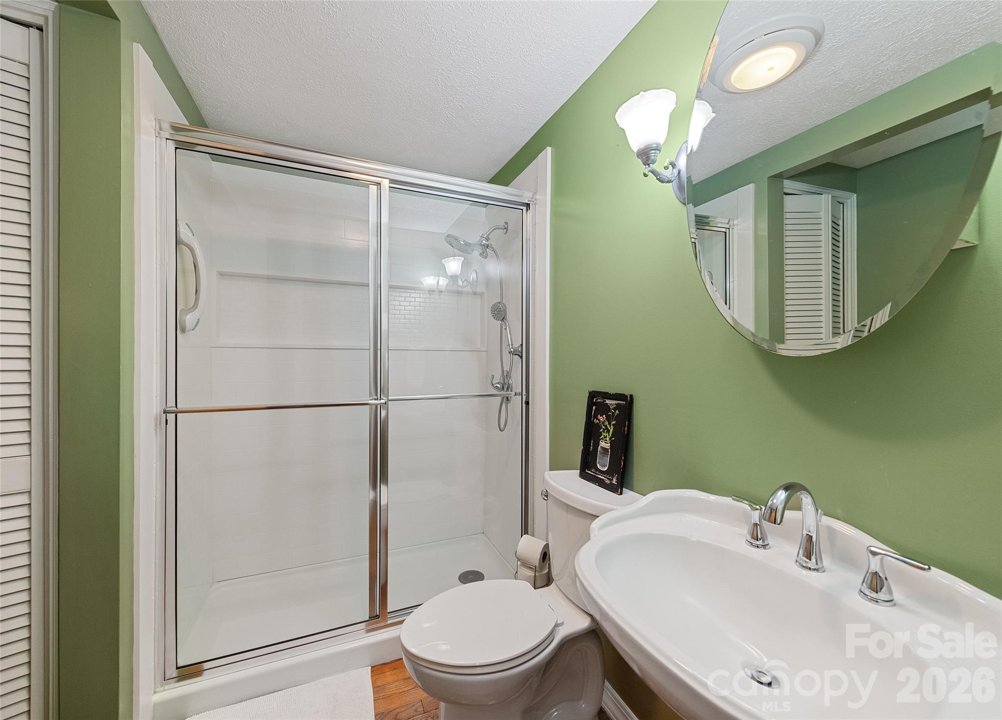 15 Whitted Road Canton, NC 28716 - Photo 20 of 38 a bathroom with a sink toilet and shower