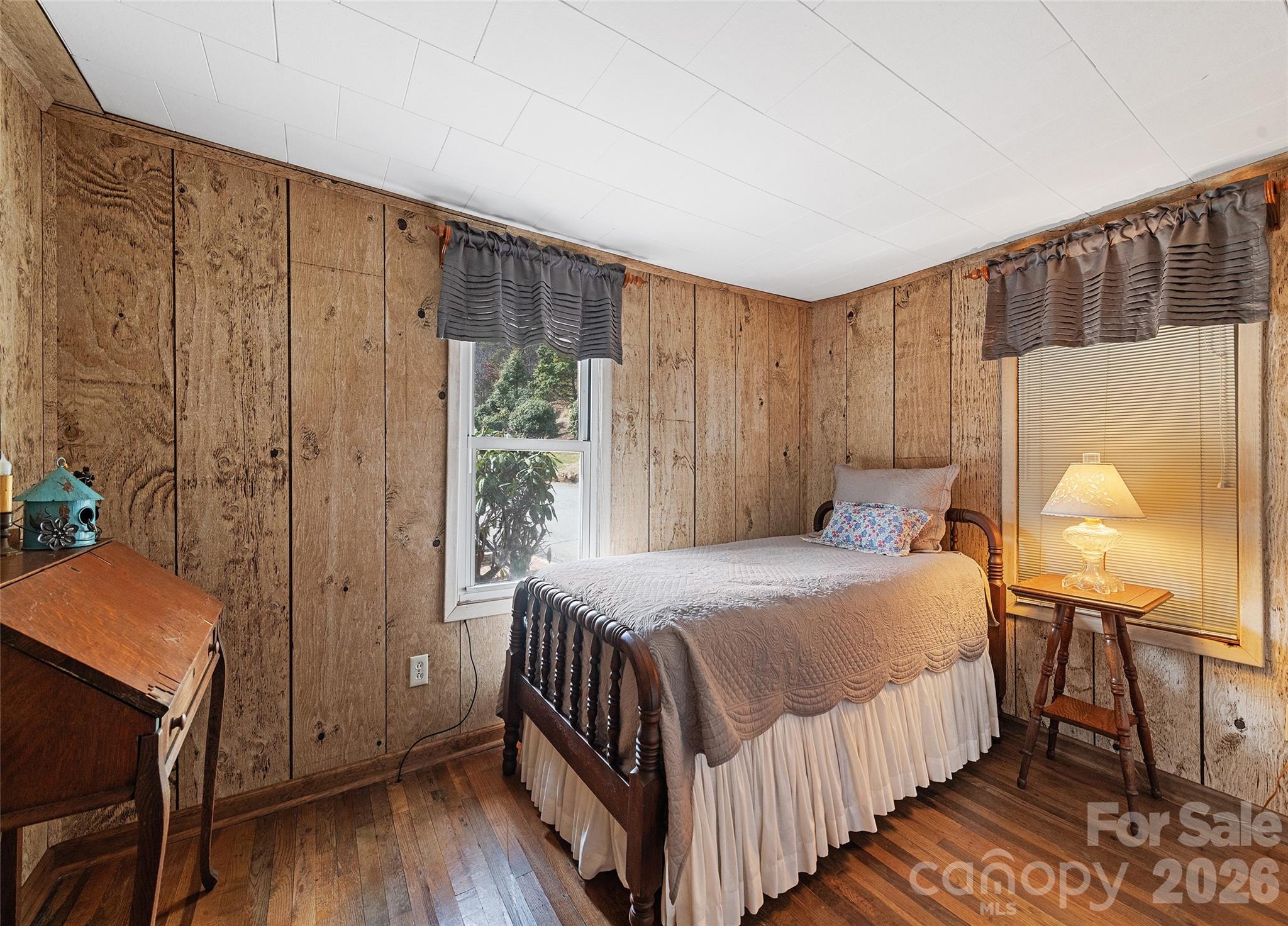 15 Whitted Road Canton, NC 28716 - Photo 21 of 38 a bedroom with a bed and a window