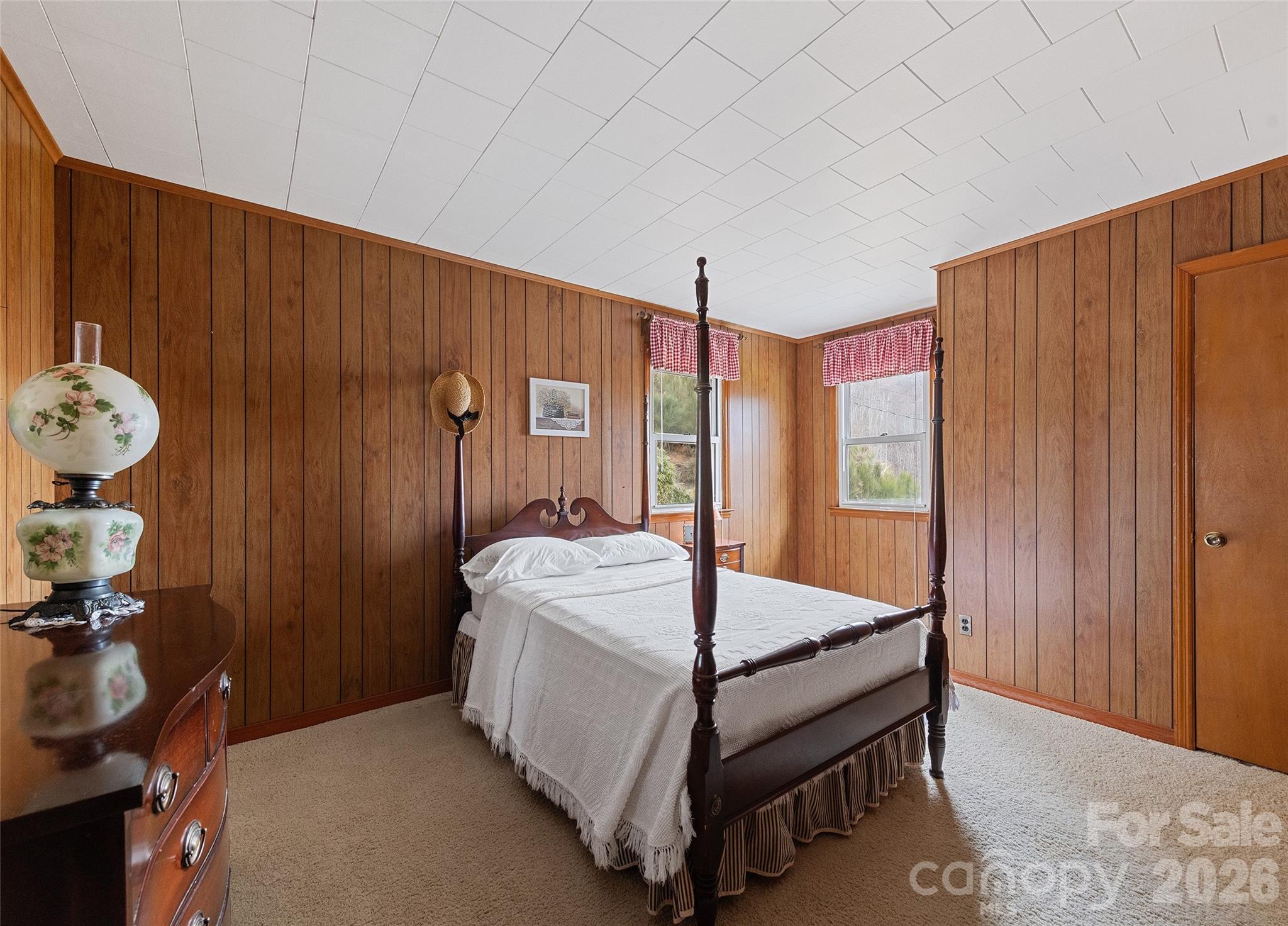 15 Whitted Road Canton, NC 28716 - Photo 26 of 38 a bed sitting in a room next to a window