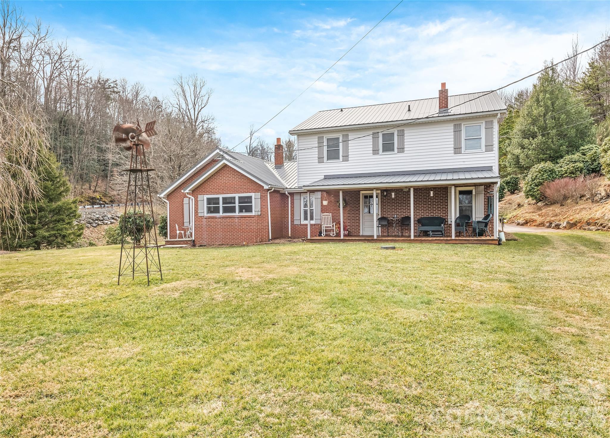 15 Whitted Road Canton, NC 28716 - Photo 32 of 38 a house view with swimming pool in front of it