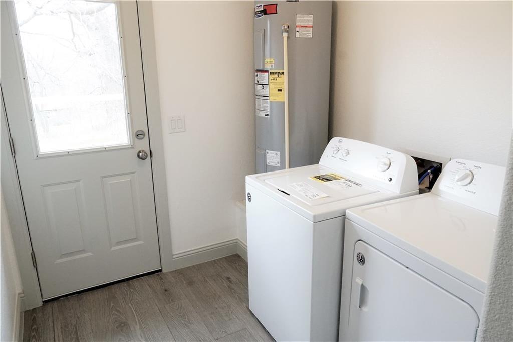 424 East Nelson Street Denison, TX 75021 - Photo 15 of 21 a utility room with dryer and washer