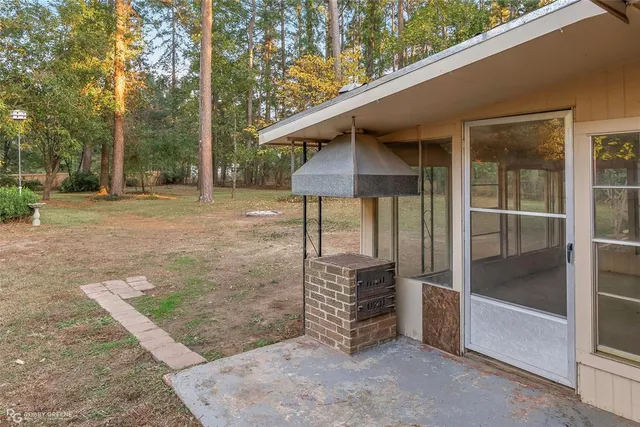 a backyard of a house with seating space